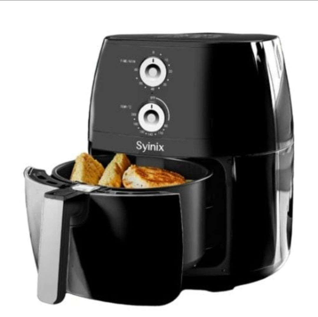 Syinix Air Fryer open basket with food inside