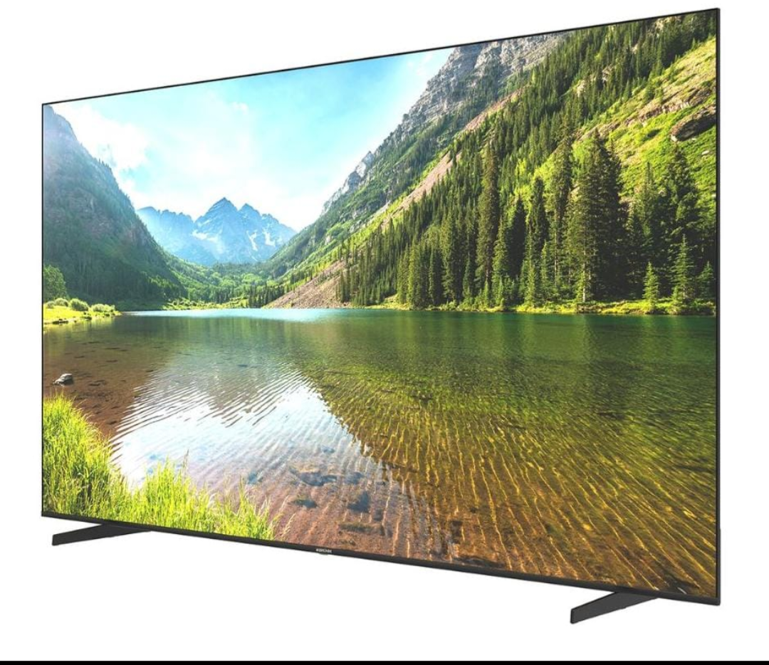 Bruhm 100 inch QLED Web Smart TV displaying stunning mountain lake landscape side angle view